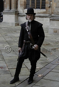 Full dress 17th Century man in Bodleian Quadrangle